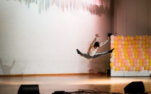 woman splitting legs on stage